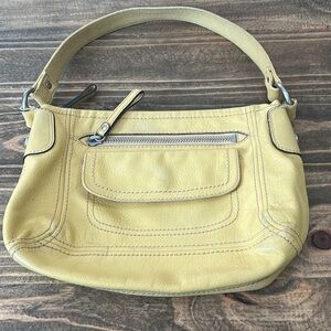fossil Leather Buttery yellow zipper pockets on Outside and inside